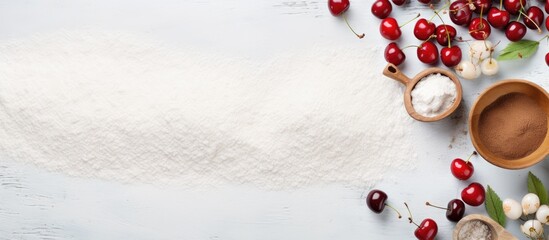 Leinwandbilder - Top view of a rustic white table with fresh cherries flour egg cinnamon and roller pin Wide space for text