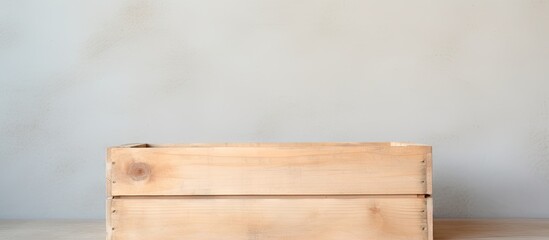 Poster - Top view of a wooden crate with lid on a light background with room for text