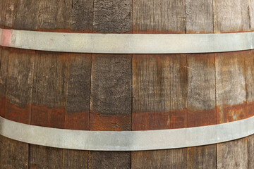 Canvas Print - Traditional wooden barrel as background, closeup. Wine making