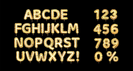 Set of golden balloon alphabet and numbers, isolated on black background.	