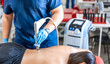 © puhimec - Extracorporeal shockwave therapy, physical therapy for neck and back muscles.
