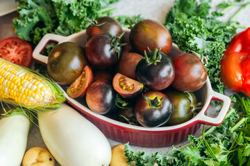 Wall Mural - Background of vegetables and herbs on the kitchen table.