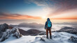 © Max - A man who enjoys hiking stands at the summit of a mountain, delighting in the breathtaking winter scenery that surrounds him.