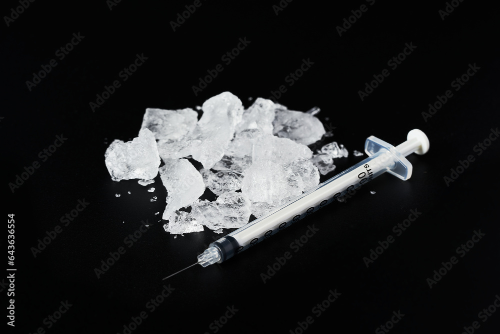 Concept Of Ice Drug Crystal Methamphetamine With Syringe Isolated On
