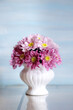 Bouquet of chrysanthemums on blue background