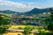Ruzomberok, Slovakia - viewpoint on the city of Ruzomberok located in a mountain valley, extensive urban development. Mountain landscape on Velka Fatra national park.