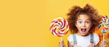 Teenage Girl Holding Lollipops In A Candy Store With Empty Space For Advertisement