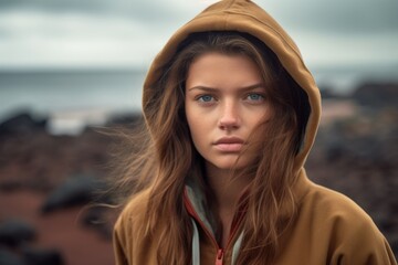 Lifestyle portrait photography of a glad girl in her 20s wearing a comfortable hoodie at the galapagos islands ecuador. With generative AI technology