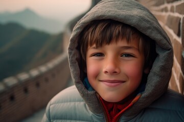 Wall Mural - Medium shot portrait photography of a joyful boy in his 30s wearing a comfortable hoodie at the great wall of china in beijing china. With generative AI technology