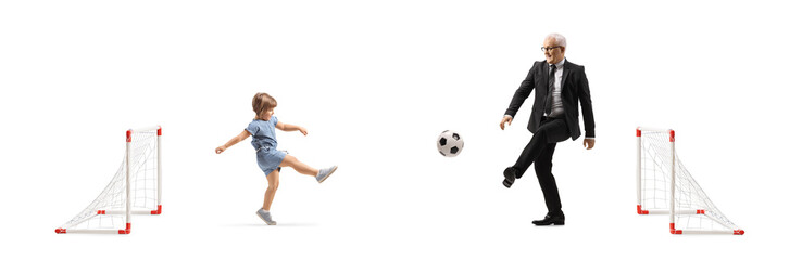 Sticker - Full length profile shot of a little girl kicking a football with a businessman