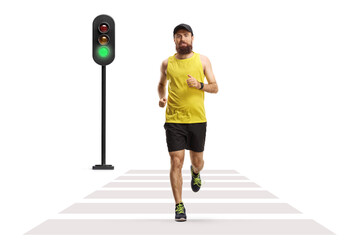 Poster - Full length portrait of a bearded guy jogging on a street