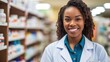 © GMZ - Pharmacist african american woman in front of pharmacy shelves