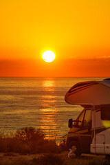 Canvas Print - Caravan on sea at sunrise.