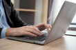 © NT_studio - Hands young caucasian businessman using laptop computer planning for success in modern office, businessman typing on notebook doing marketing, executive or manager with handsome, business concept.