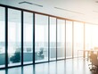 © Afzal24 - Beautiful blurred background of a light modern Corporate office interior with panoramic windows and beautiful lighting.