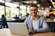 © CYBERUSS - Handsome Latin Businessman Working with Computer, Male Manager Works in Modern Office, Analysis Data Statistics and Business Planning.
