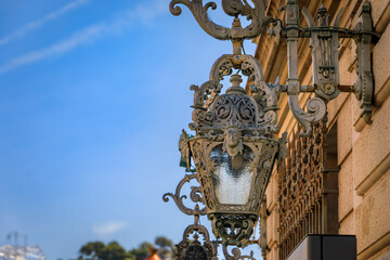 Sticker - Ornate metal old light fixture of the Opera of Nice, Municipal Theater built in 1776 in Old Town Vieille Ville, Nice, French Riviera, South of France