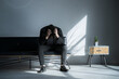 © kapinon - A man depressed in his chair Image of failure in investments in stocks, forex, virtual currency, etc.