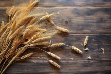 Wall Mural - overhead view of scattered wheat ears on rustic wooden table