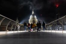 Night View Of The St. Paul's Cathedral From The Millennium Bridge
