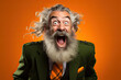 An angry elderly Scottish man with windswept hair and a long white beard wearing a green jacket on an orange background