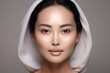 © mariof - Asian Chinese woman face with health skin for skincare and cosmeticsa dvertising .  Beautiful aging young looking woman, copy space , ai generative