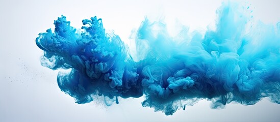 Poster - Blue powder explosion isolated on a isolated pastel background Copy space