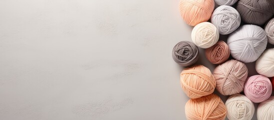 Aufkleber - Gray and beige yarn balls used for knitting isolated pastel background Copy space