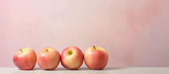 Poster - Four apples that are very fresh isolated pastel background Copy space