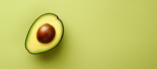 Aufkleber - Avocado half on a isolated pastel background Copy space