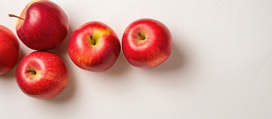 Poster - Four apples red on isolated pastel background Copy space