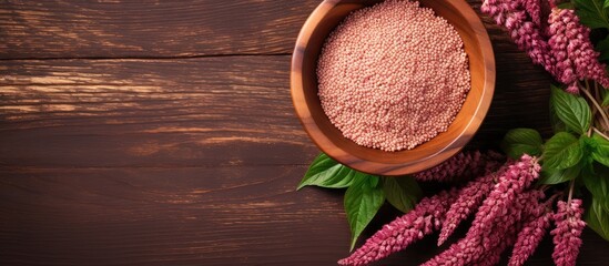 Aufkleber - Healthy food Amaranth seeds in bowl made of wood isolated pastel background Copy space