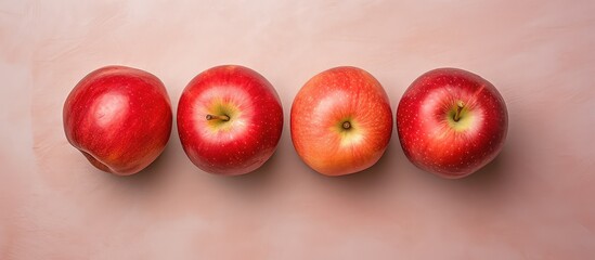 Poster - Four apples red on isolated pastel background Copy space