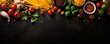 © Daniela - Italian food background on black stone board. Pasta, fresh tomatoes, basil, garlic, spices. Top view with copy space
