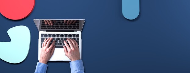 Poster - Person using a laptop computer with geometric shaped objects from above