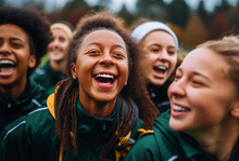 A Group Of Young Teenage Girls Revels In Victory On The Soccer Or Football Field, Their Faces Lit Up With Joy And Laughter, And Togetherness Shines Through As They Celebrate A Winning Match.