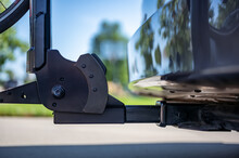 Rear Mounted Bike Rack Connected To A Vehicle Trailer Hitch Receiver. 