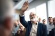 © OMD - shot of a politician raising his hand during a workshop