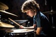 © OMD - shot of a young boy playing the drums