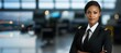© Clearmind - Confident African American female airline pilot in uniform in airport background, professional flying company wallpaper, Horizontal format 9:4
