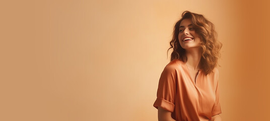 smiling stylish gentle young woman in orange shirt isolated on a flat orange background for beauty a