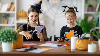 Wall Mural - Happy family preparing for Halloween