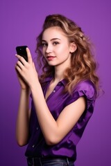 Wall Mural - portrait, model and girl with phone in studio isolated on a purple background