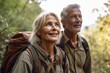 © altitudevisual - portrait of a mature woman hiking with her husband in nature