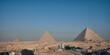 Great Pyramid, the Pyramid of Khafre, and the Pyramid of Menkaure .Giza pyramid complex in the morning. Giza plateau, Cairo, Egypt