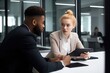 © altitudevisual - shot of two young colleagues using a digital tablet together in a modern office