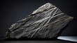Gneiss stone, emphasizing its banding and folding.