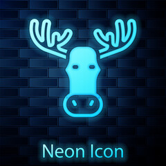 Canvas Print - Glowing neon Moose head with horns icon isolated on brick wall background. Vector