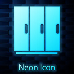 Poster - Glowing neon Wardrobe icon isolated on brick wall background. Vector