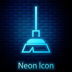 Poster - Glowing neon Handle broom icon isolated on brick wall background. Cleaning service concept. Vector